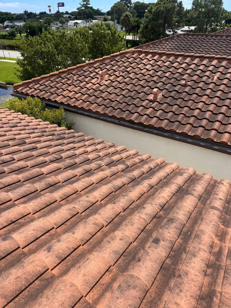Barrel tile roof soft wash in Arbor Parc, Riviera Beach, before