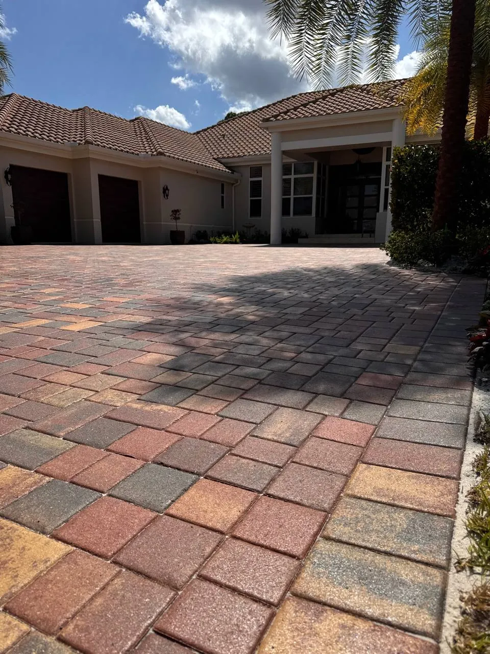 Multicolour paver driveway clean, sand, tint and seal, after