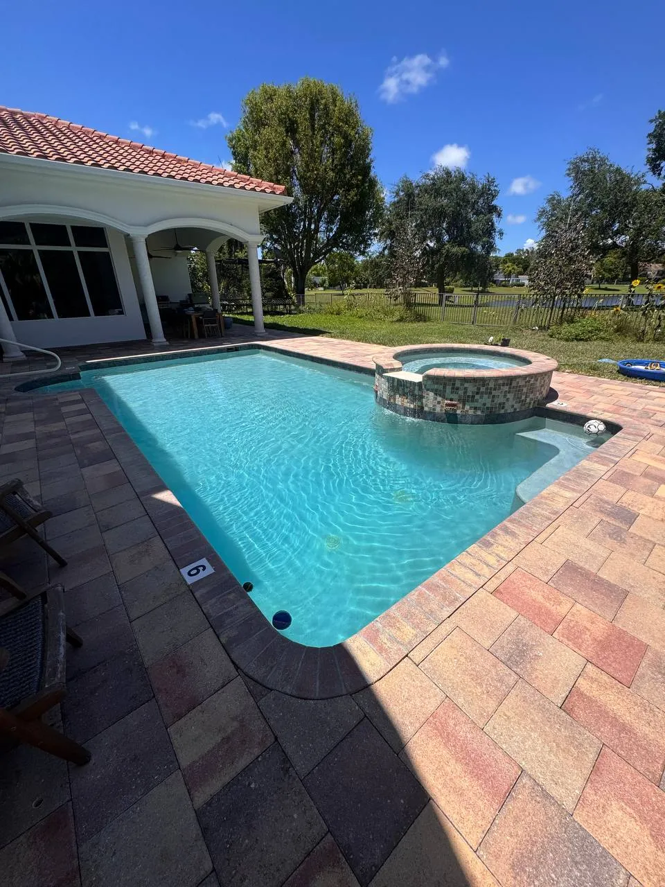 Paver walkway and pool deck pressure washing
